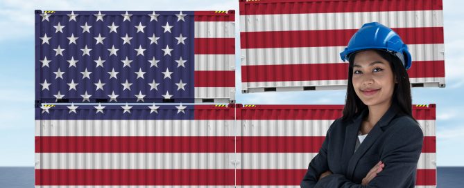 Female U.S. importer in front of cargo containers painted with the American flag