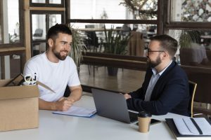 Business professional discussing tariff negotiations with overseas supplier
